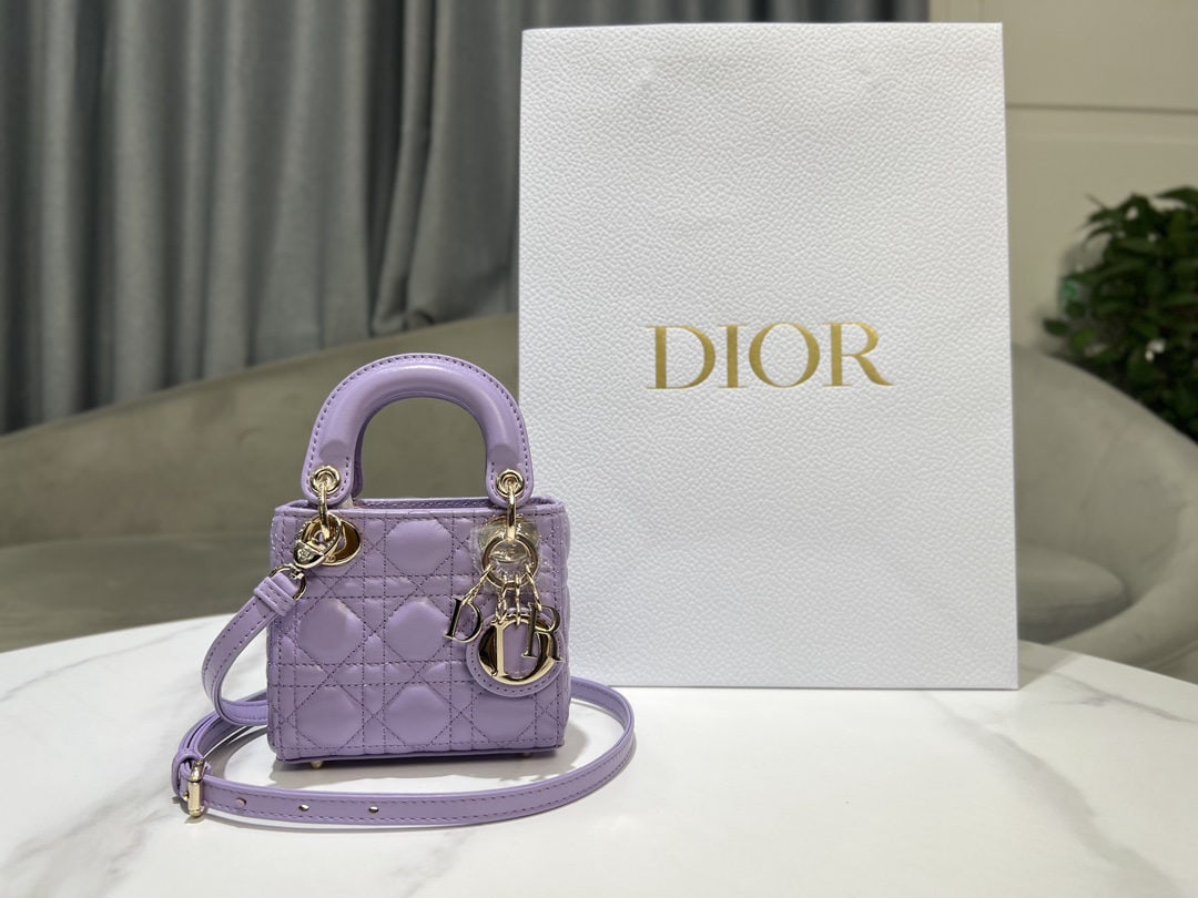 Christian Dior Lady Dior: We offer FREE SHIPPING for both domestic and international clients who bid over $500. This 12cm mini Lady Dior handbag in pale purple lambskin embodies Dior's profound understanding of elegance and be