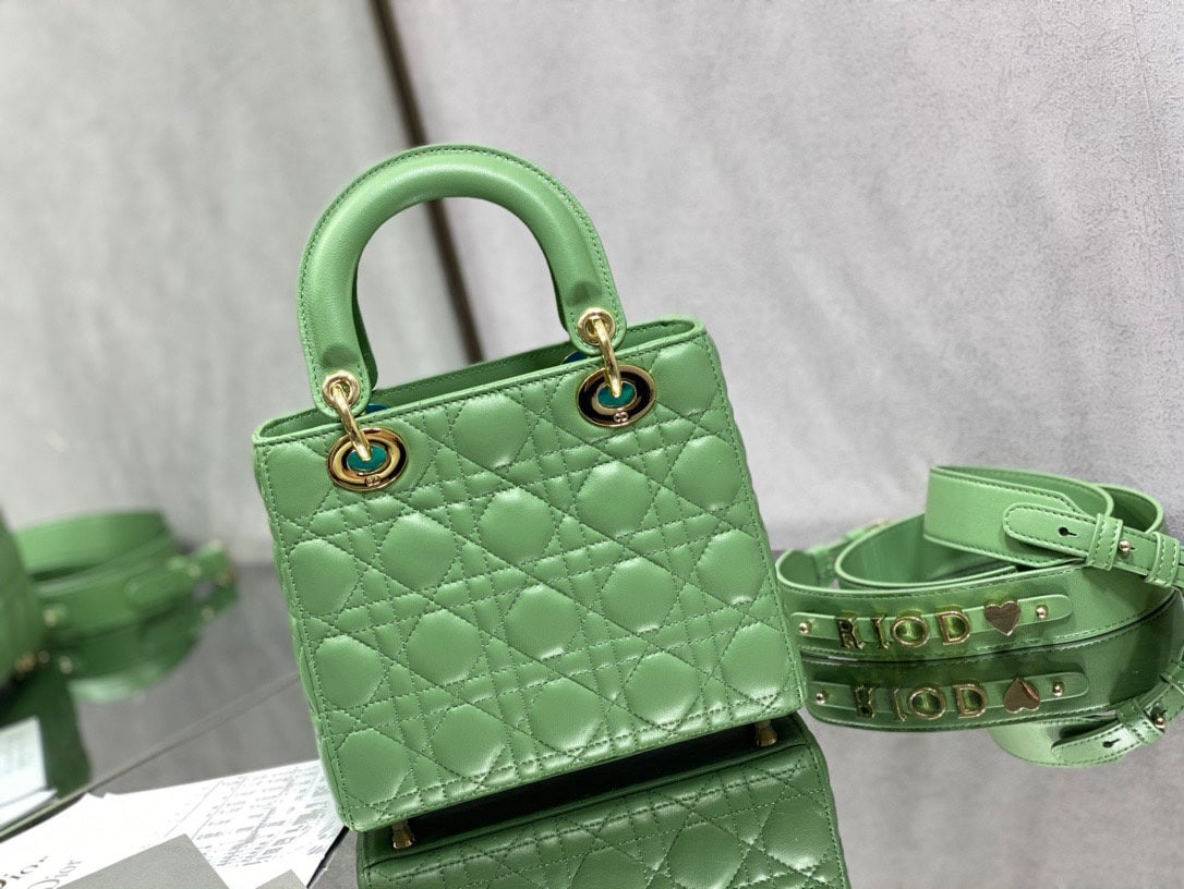 Christian Dior: We offer FREE SHIPPING for both domestic and international clients who bid over $500. Lady Dior's four-compartment enamel buckle in mint green is an elegant and classic design that never goes out of s