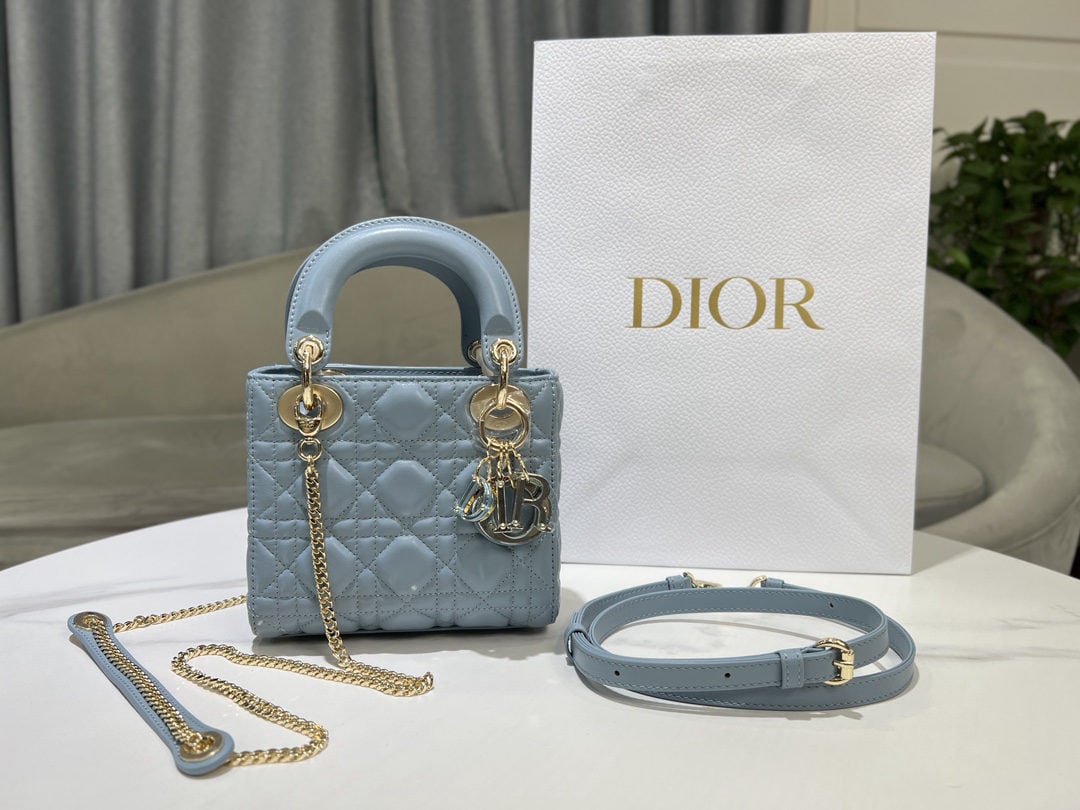 Christian Dior Lady Dior: We offer FREE SHIPPING for both domestic and international clients who bid over $500. The three-compartment Lady Dior handbag in sky blue with a jeweled clasp embodies Dior's profound understanding of