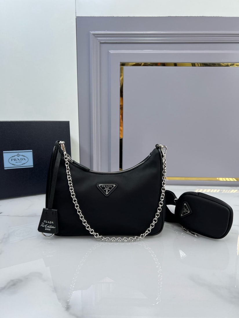 PRADA Hobo: We offer FREE SHIPPING for both domestic and international clients who bid over $500. The Hobo handbag/shoulder bag is amazing! It's a three-in-one bag ?C a waist bag, crossbody bag, or
