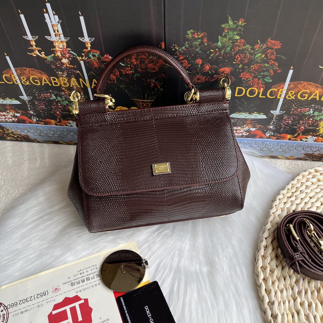 Dolce & Gabbana: We offer FREE SHIPPING for both domestic and international clients who bid over $500. Dolce & Gabbana Lizard Diamond Perfect Bag Shape, made of top-grain lizard-patterned calfskin. A versatile bag sty