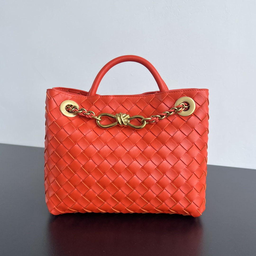 Bottega Veneta Andiamo: We offer FREE SHIPPING for both domestic and international clients who bid over $500. The Bottega Veneta Andiamo's upgraded black and gold chain adds a touch of sophistication. The lambskin woven leat