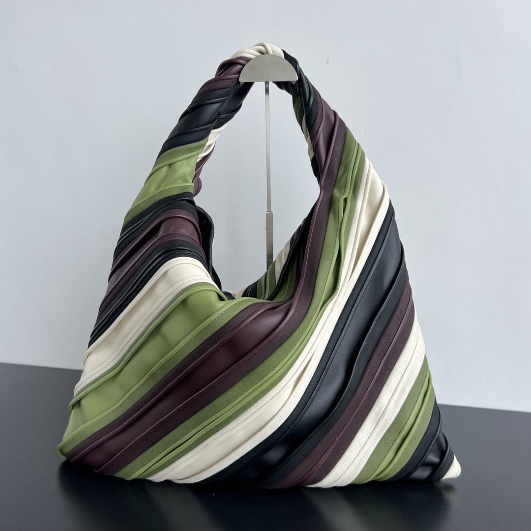 Bottega Veneta: We offer FREE SHIPPING for both domestic and international clients who bid over $500. The Bottega Veneta runway-inspired HOP Bag features a patchwork of matcha, white, and berry-colored leather stripe