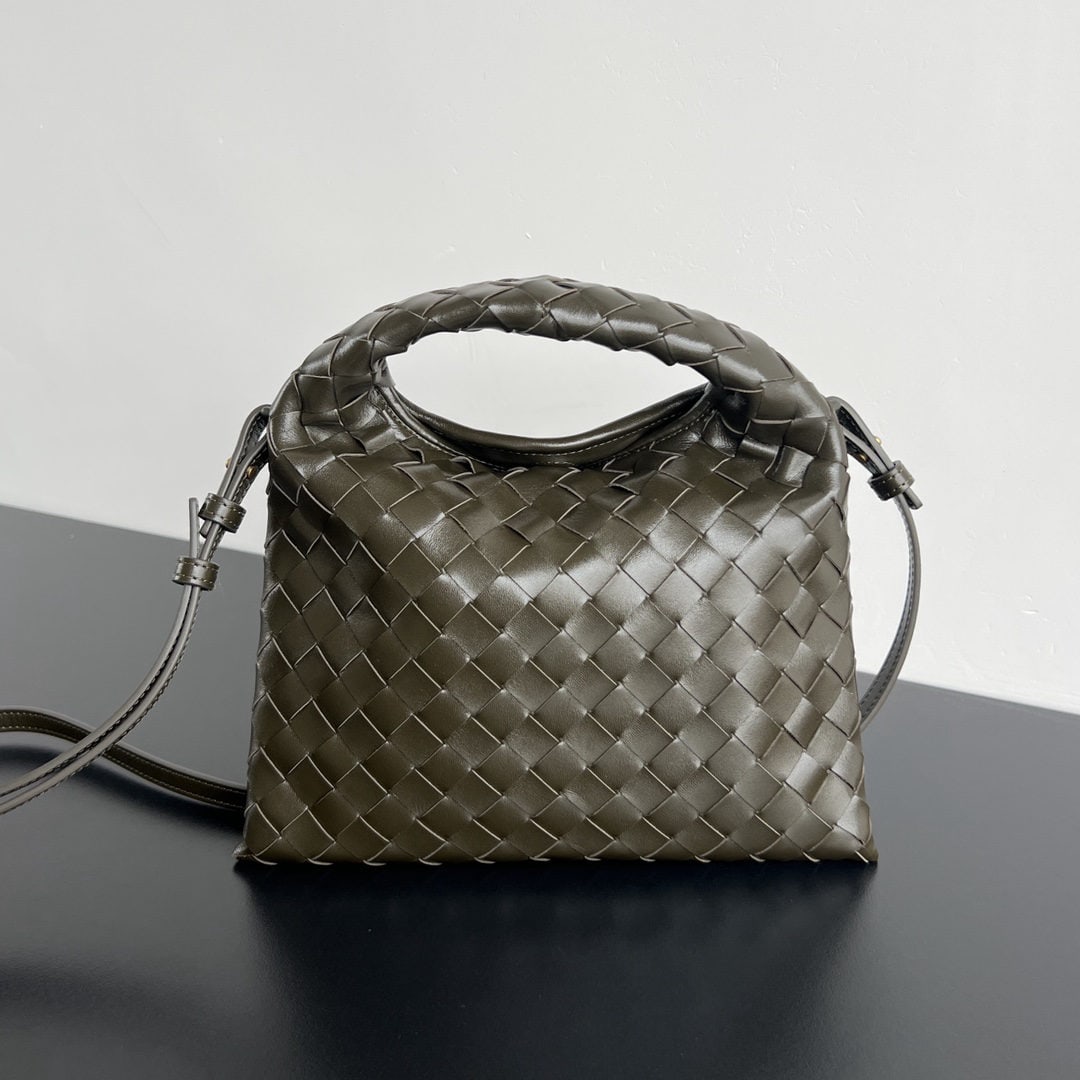 Bottega Veneta Mini Hop Cow: We offer FREE SHIPPING for both domestic and international clients who bid over $500. The Bottega Veneta Mini Hop, a best-selling calfskin bag, features a body and handles woven from a single piece of