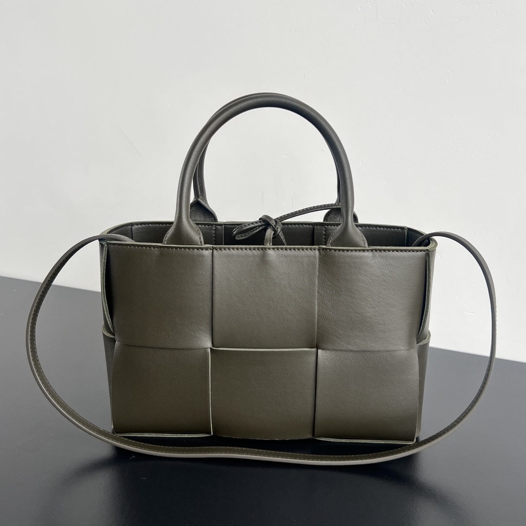 Bottega Veneta Mini Tote: We offer FREE SHIPPING for both domestic and international clients who bid over $500. Bottega Veneta's new Mini Tote is a very popular three-compartment bag. The new version features a shoulder strap 
