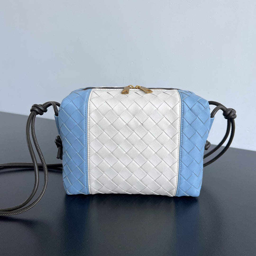 Bottega Veneta Loop: We offer FREE SHIPPING for both domestic and international clients who bid over $500. Bottega Veneta's new Loop camera bag features a unique and trendy design with three different colors, perfect for 
