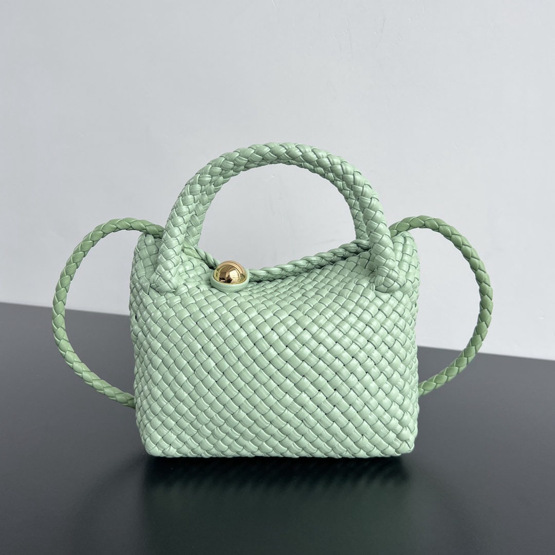 Bottega Veneta: We offer FREE SHIPPING for both domestic and international clients who bid over $500. The Bottega Veneta mini Tosca crossbody bag, crafted with the finest craftsmanship, features a round gold bead tha