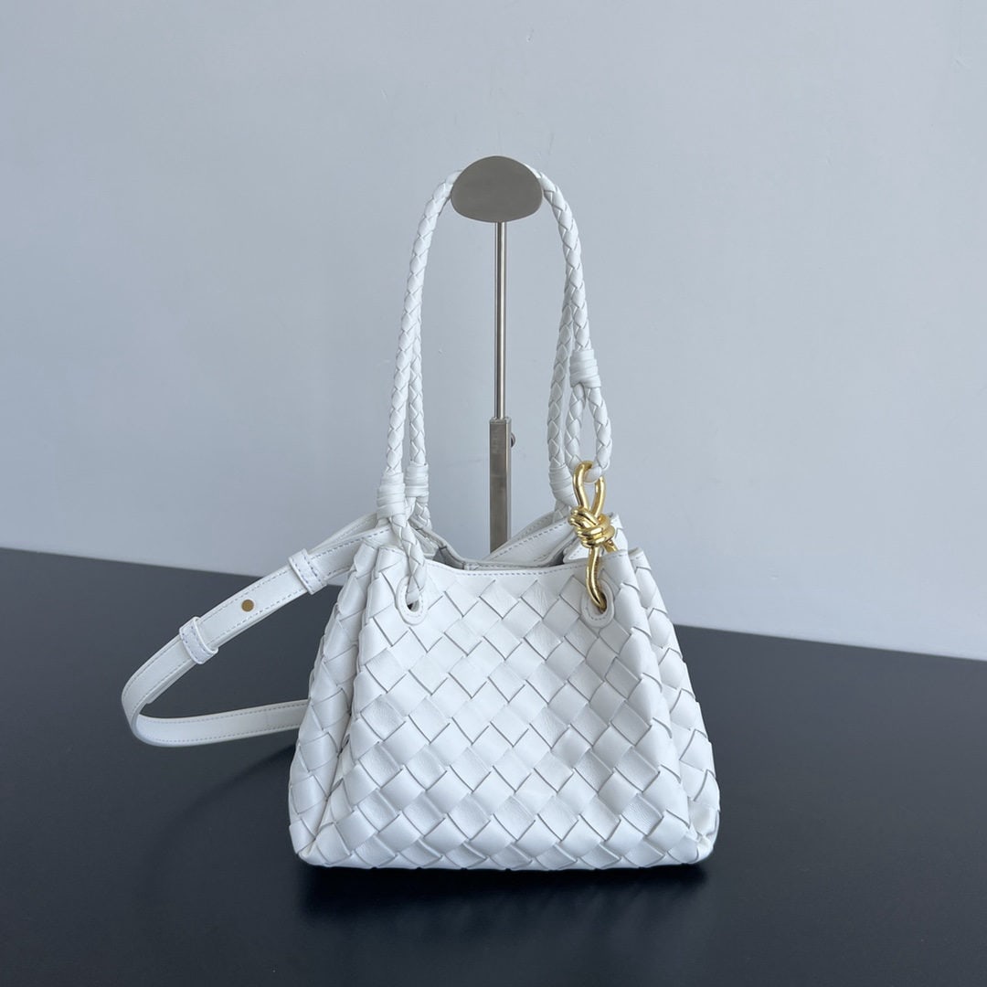 Bottega Veneta: We offer FREE SHIPPING for both domestic and international clients who bid over $500. The Bottega Veneta intrecciato woven leather shoulder bag features a detachable shoulder strap and a mini pouch in