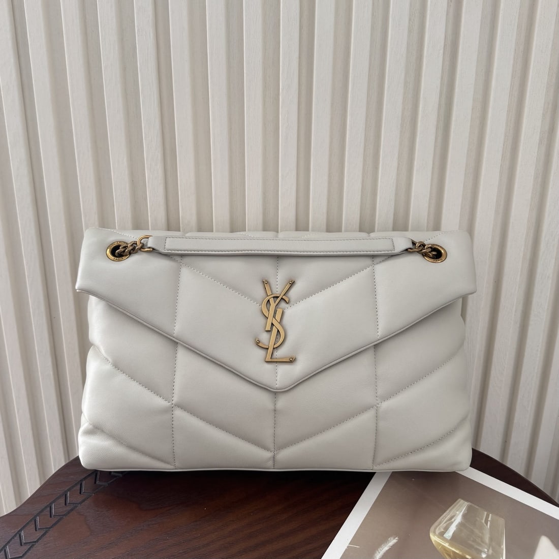 Yves Saint Laurent Louis Puffer Large Quilted Flat Lambskin Bag: We offer FREE SHIPPING for both domestic and international clients who bid over $500. LOULOU PUFFER Large Quilted Flat Lambskin Bag: The leather is soft and supple to the touch, with a grosgrain linin