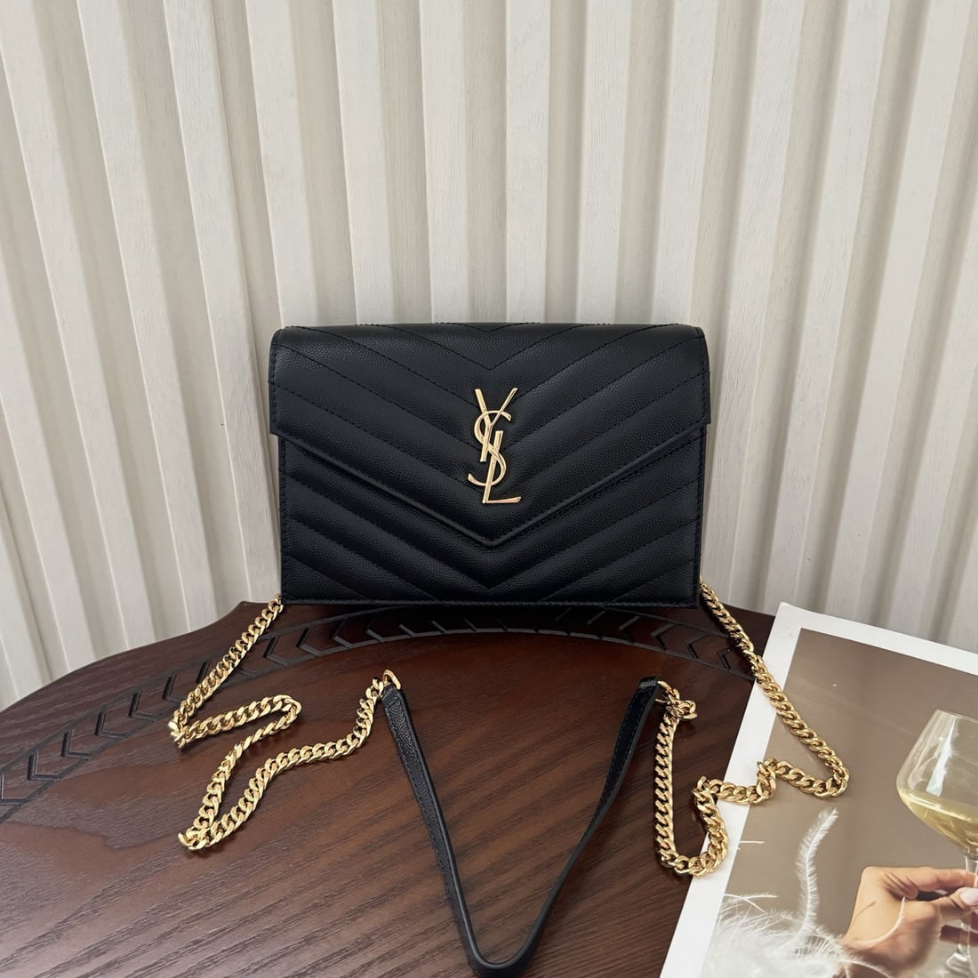 Yves Saint Laurent Monogram Caviar Envelope: We offer FREE SHIPPING for both domestic and international clients who bid over $500. Monogram caviar envelope bag, a very practical small bag. The shoulder strap is detachable and can be used as a cl