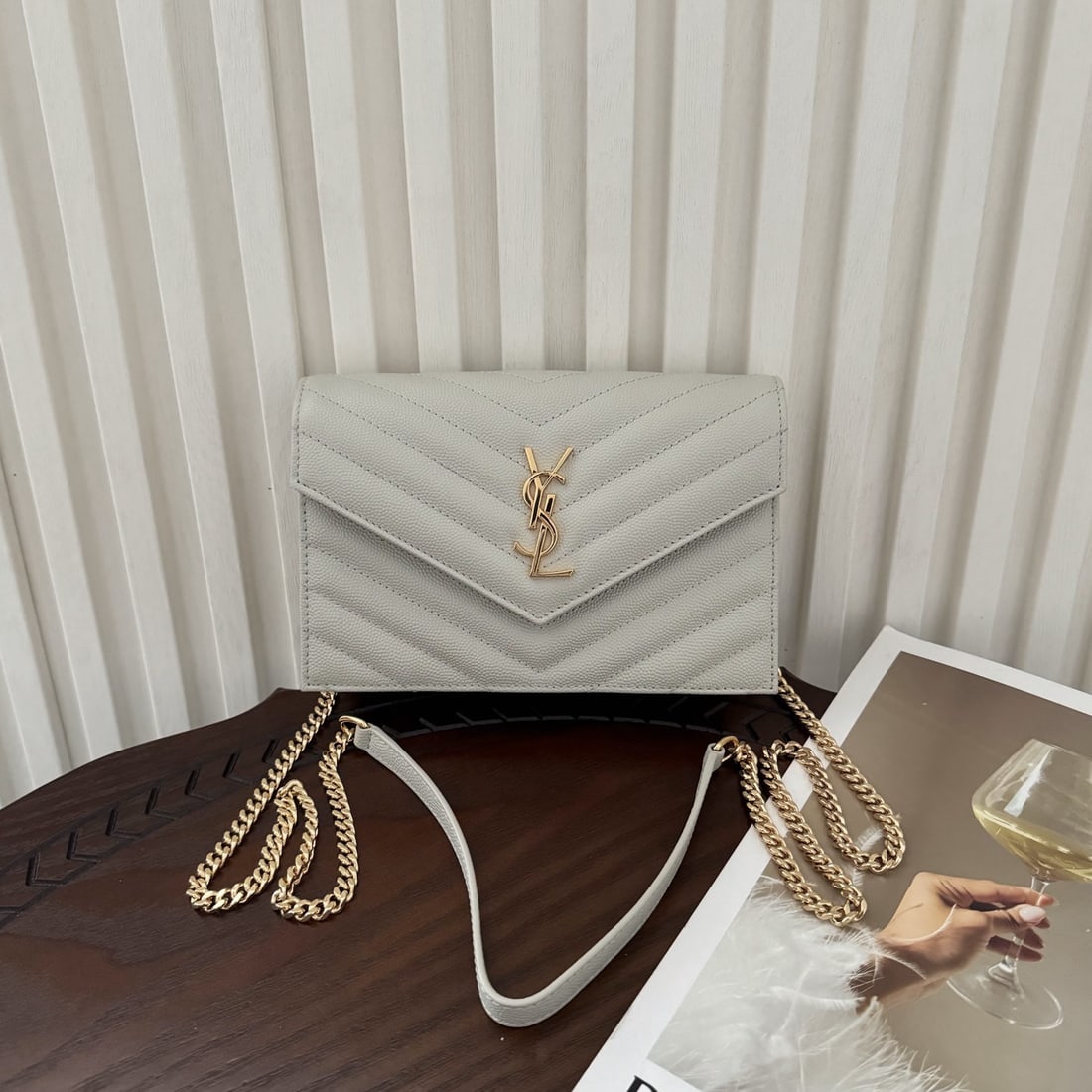 Yves Saint Laurent Monogram Caviar Envelope: We offer FREE SHIPPING for both domestic and international clients who bid over $500. Monogram caviar envelope bag, a very practical small bag. The shoulder strap is detachable and can be used as a cl