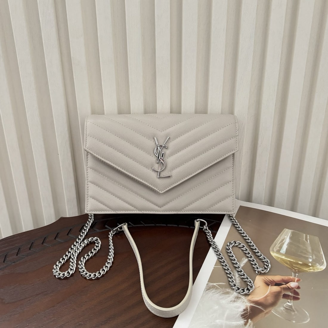 Yves Saint Laurent Monogram Caviar Envelope: We offer FREE SHIPPING for both domestic and international clients who bid over $500. Monogram caviar envelope bag, a very practical small bag. The shoulder strap is detachable and can be used as a cl
