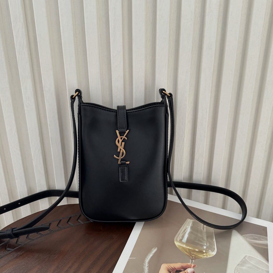 Yves Saint Laurent LE: We offer FREE SHIPPING for both domestic and international clients who bid over $500. LE HOBO Mini Vertical Phone Bag: Compact, exquisite, and stylish, this crossbody bag design is easy to match with