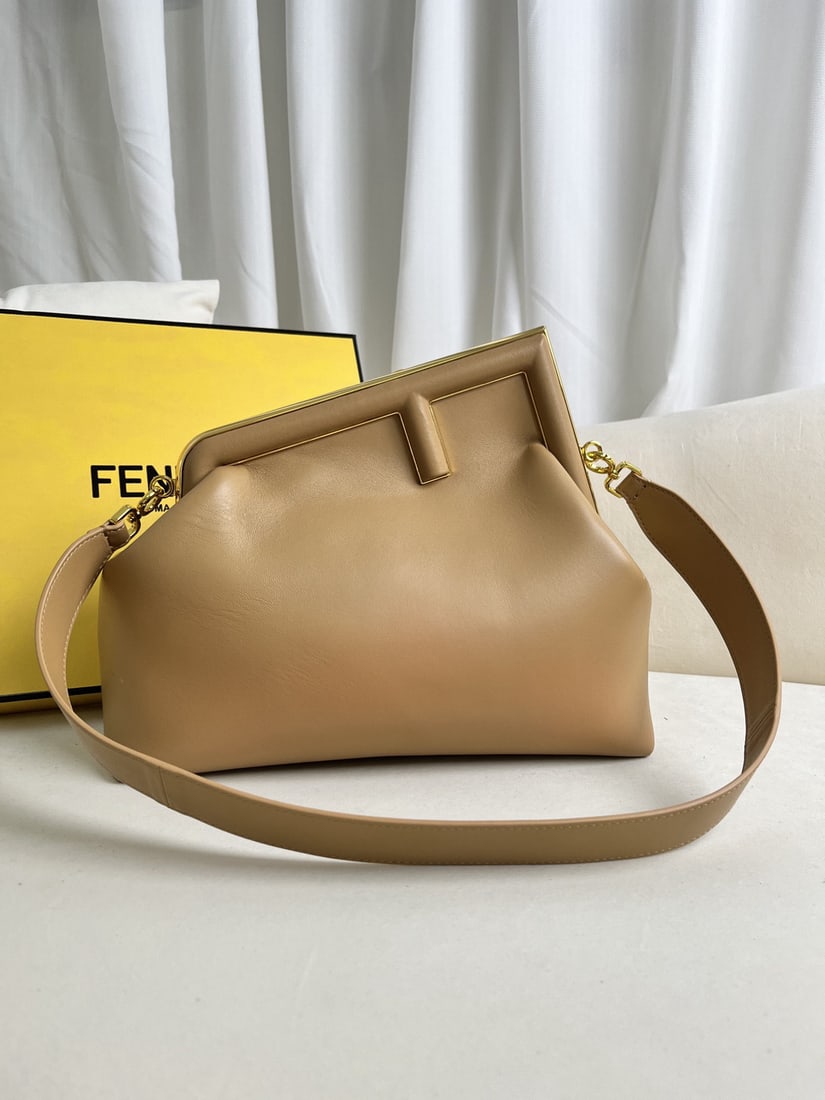 Fendi First: We offer FREE SHIPPING for both domestic and international clients who bid over $500. The new large-sized FENDI First in apricot color has arrived!! Designed under Kim Jones' direction, this first FEN
