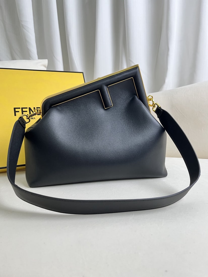 Fendi First: We offer FREE SHIPPING for both domestic and international clients who bid over $500. The all-new black FENDI First, a large size, is here!! Designed under Kim Jones' direction, this first FENDI bag