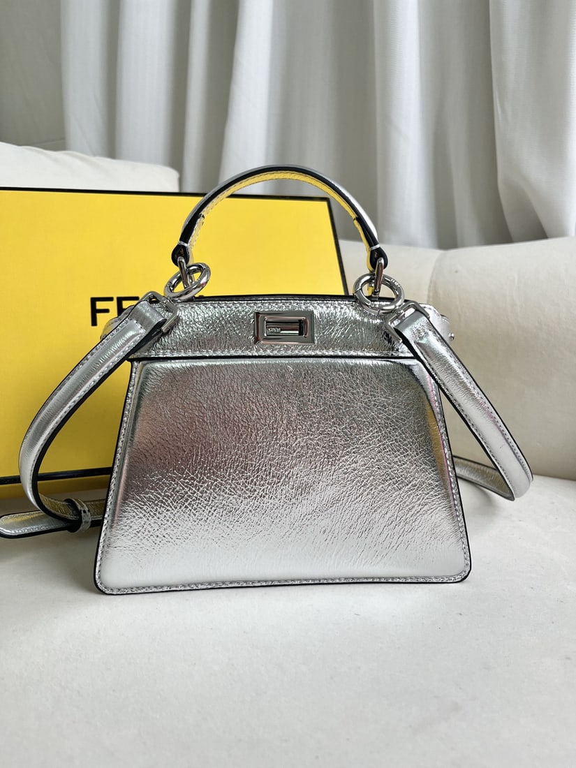 Fendi Peekaboo ISeeU Petite: We offer FREE SHIPPING for both domestic and international clients who bid over $500. The silver Peekaboo ISeeU Petite and light blue Nappa leather handbag with compartments are both small and cute.