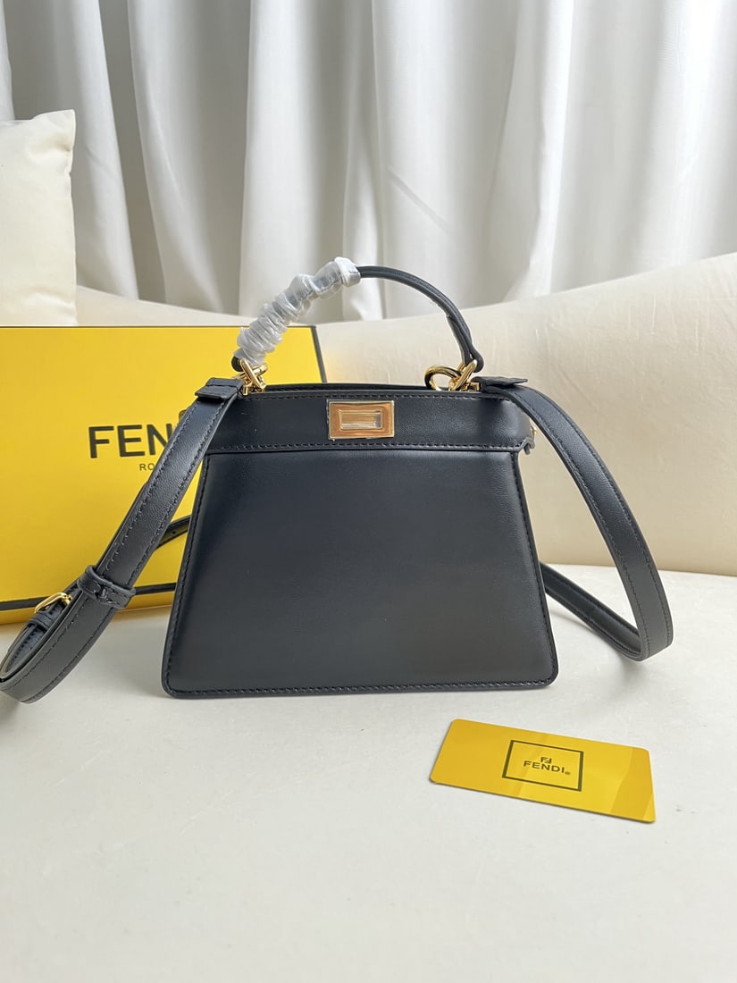 Fendi Peekaboo ISeeU Petite: We offer FREE SHIPPING for both domestic and international clients who bid over $500. The black Peekaboo ISeeU Petite is a small, cute, and compact handbag made of light blue, double-layered Nappa lea