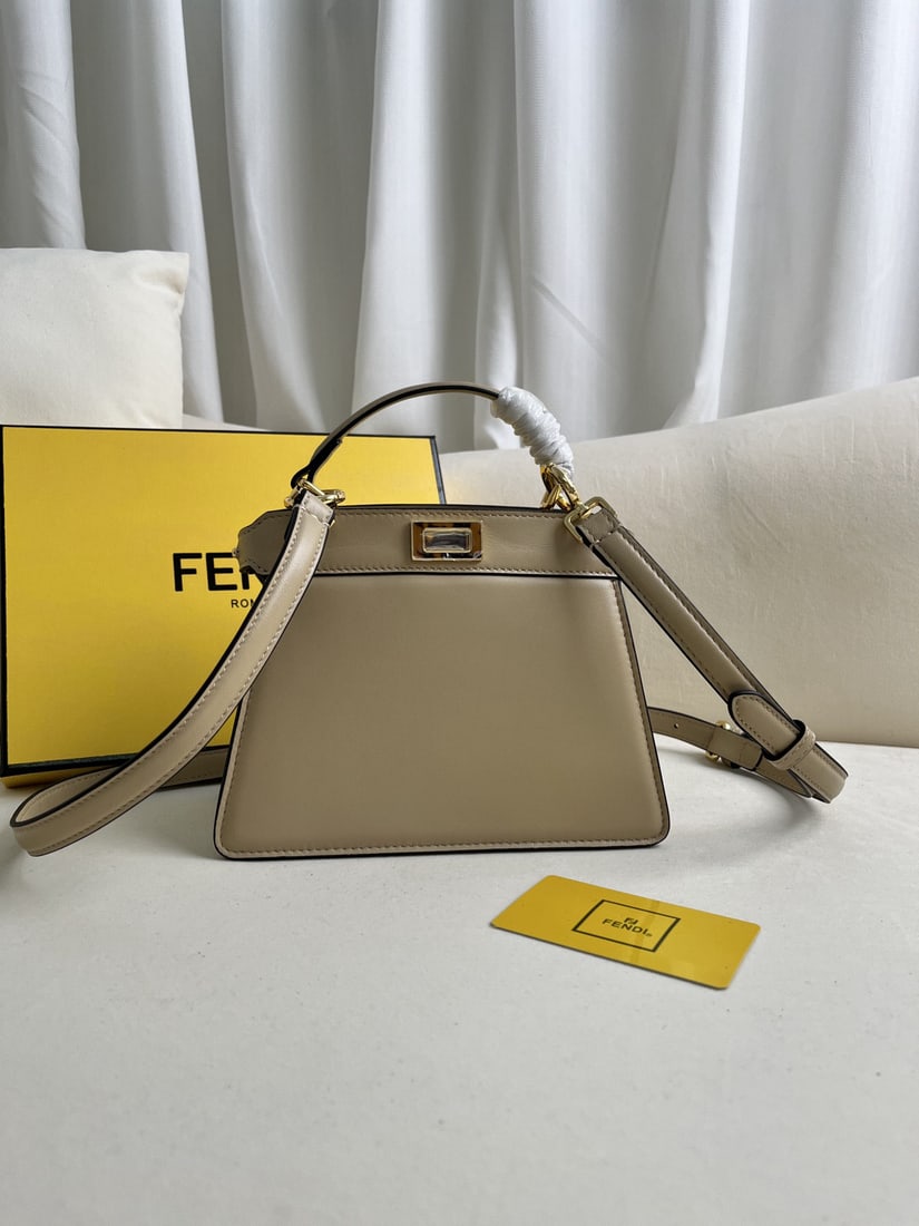 Fendi Peekaboo ISeeU Petite: We offer FREE SHIPPING for both domestic and international clients who bid over $500. The Peekaboo ISeeU Petite is a small, cute Peekaboo ISeeU handbag in dove grey and light blue with a