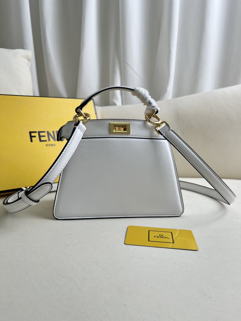 Fendi Peekaboo ISeeU Petite: We offer FREE SHIPPING for both domestic and international clients who bid over $500. The white Peekaboo ISeeU Petite is a small, cute icon. Made of light blue, double-layered Nappa leather, it featur
