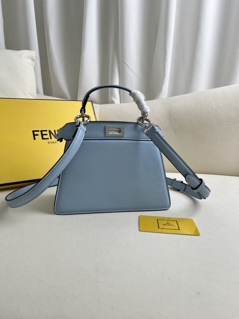 Fendi Peekaboo ISeeU Petite: We offer FREE SHIPPING for both domestic and international clients who bid over $500. The Iconic Peekaboo ISeeU Petite is a small, cute handbag made of light blue, double-layered Nappa leather. It