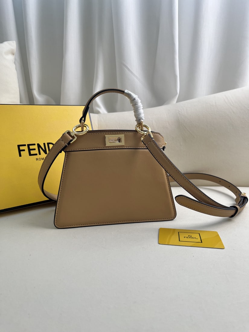 Fendi Peekaboo ISeeU Petite: We offer FREE SHIPPING for both domestic and international clients who bid over $500. The apricot-colored Peekaboo ISeeU Petite is a small and adorable Iconic Peekaboo ISeeU handbag with a light