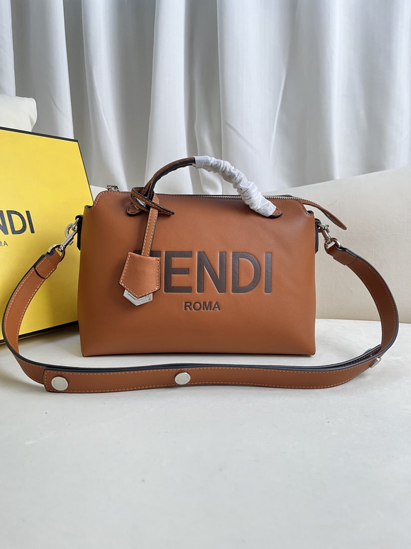 Fendi ?BY THE WAY: We offer FREE SHIPPING for both domestic and international clients who bid over $500. Brown BY THE WAY zip-lock Boston tote bag with a double-handle design and decorative plaque. The interior features