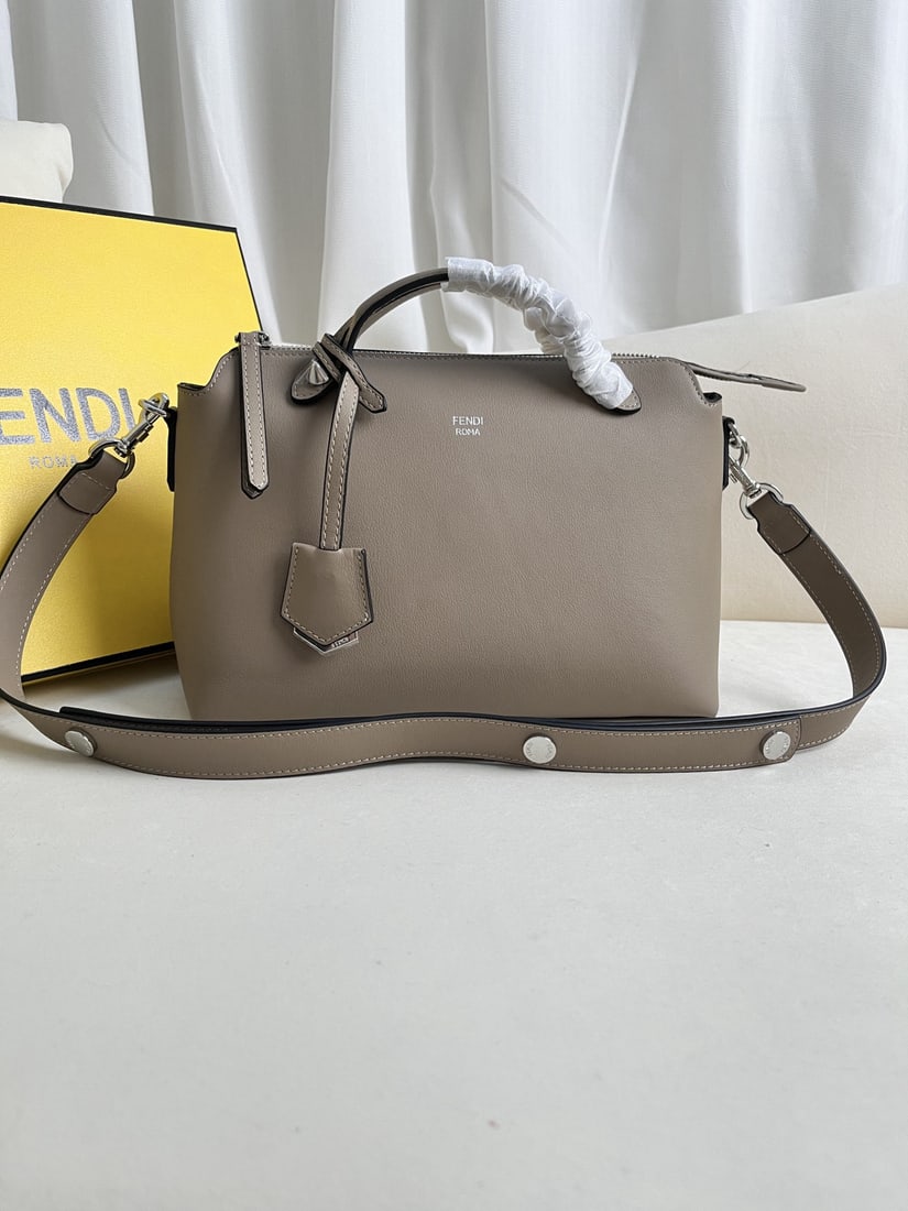 Fendi ?BY THE WAY: We offer FREE SHIPPING for both domestic and international clients who bid over $500. Pigeon Grey BY THE WAY Zip-Open Boston Handbag, with a double-handle design and adorned with a plaque. The interio