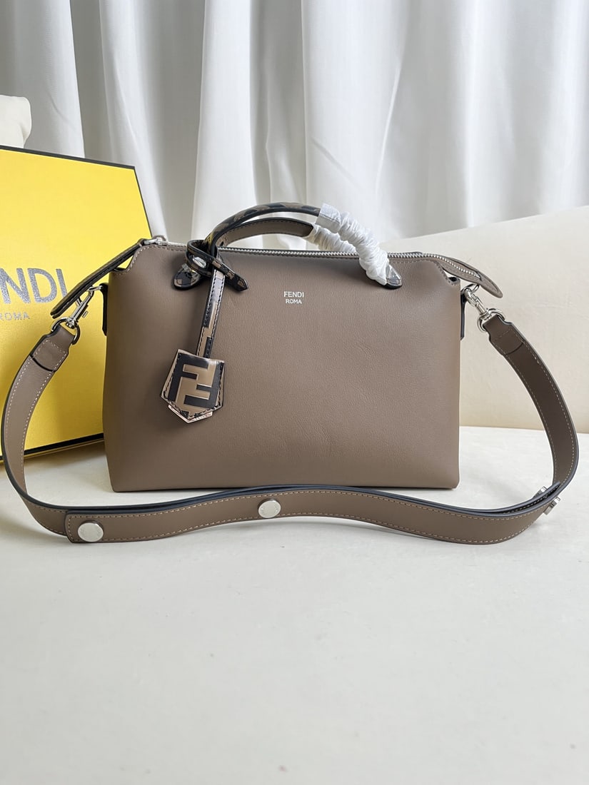 Fendi ?BY THE WAY: We offer FREE SHIPPING for both domestic and international clients who bid over $500. Khaki BY THE WAY zip-lock Boston handbag, with a double-handle design and embellished with a plaque. The interior 