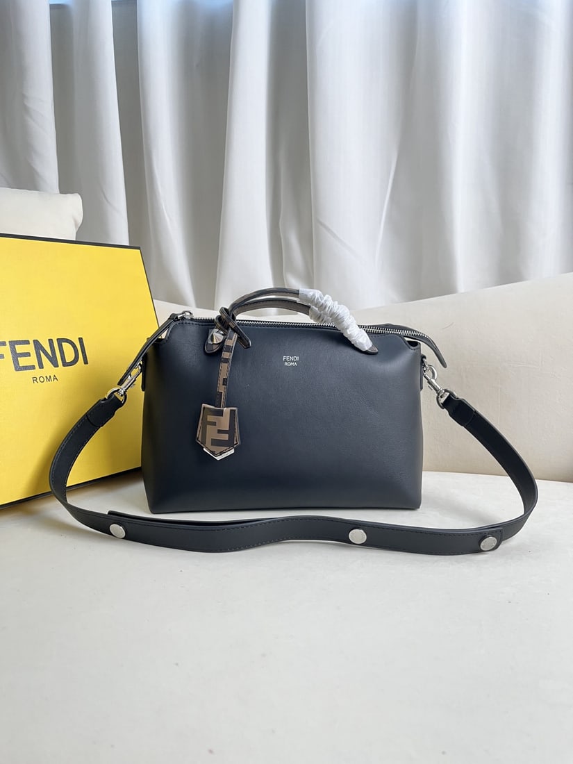 Fendi ?BY THE WAY: We offer FREE SHIPPING for both domestic and international clients who bid over $500. Black BY THE WAY zip-lock Boston tote bag with a double-handle design and decorative plaque. The interior features