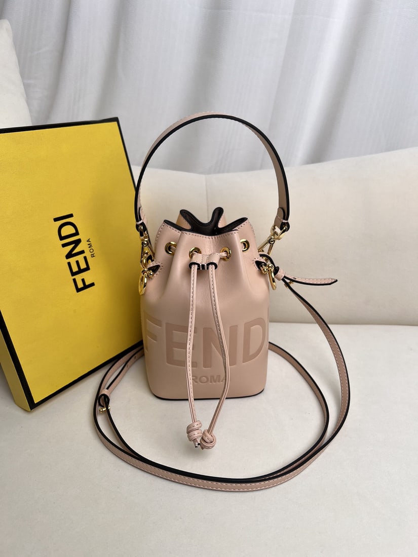 Fendi Mon Tresor: We offer FREE SHIPPING for both domestic and international clients who bid over $500. Pink Mon Tresor Light Blue Leather Mini Handbag. This Mon Tresor small bucket bag features a drawstring closure an