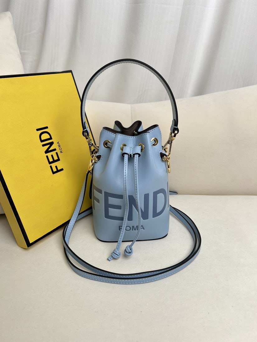 Fendi Mon Tresor: We offer FREE SHIPPING for both domestic and international clients who bid over $500. Light blue Mon Tresor mini leather handbag. This Mon Tresor small bucket bag features a drawstring closure and Fen