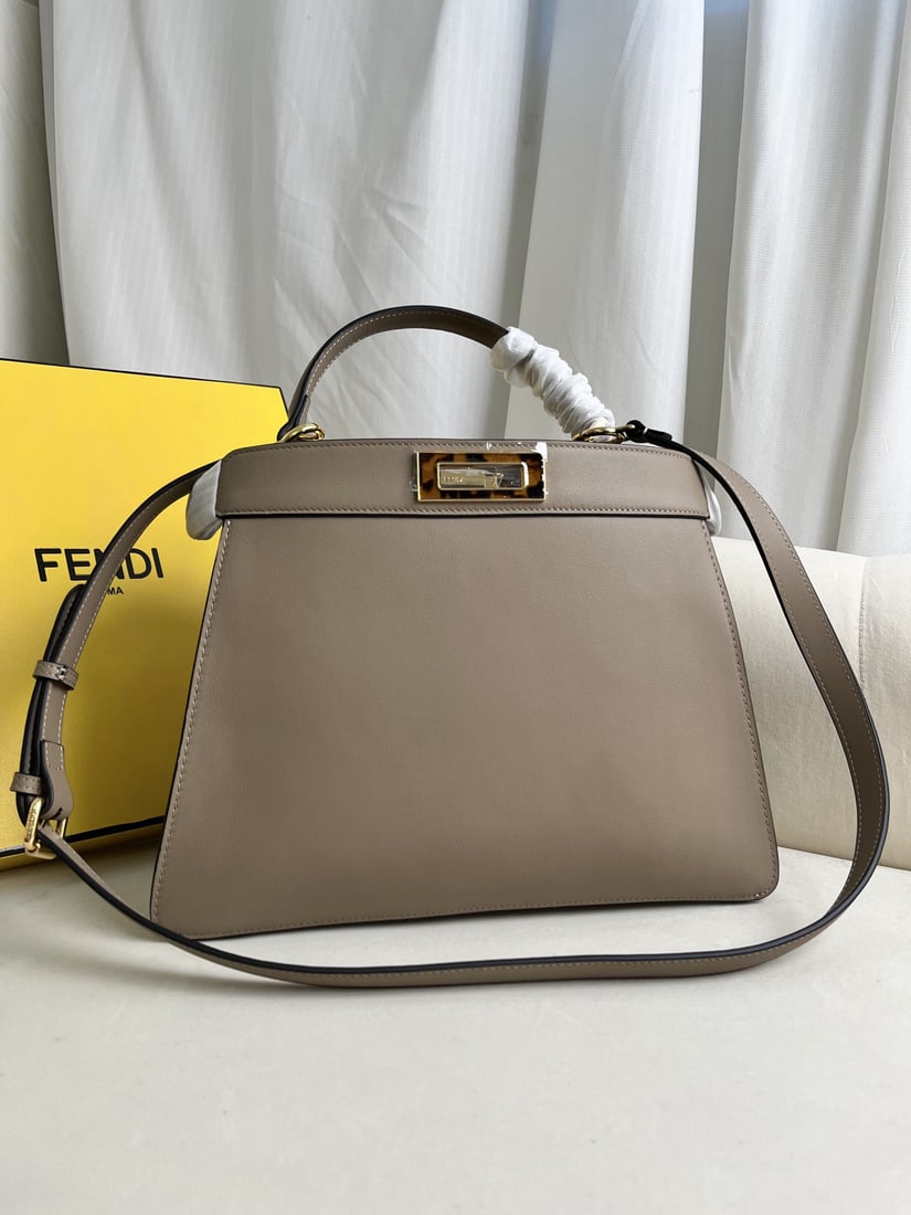 Fendi Peekaboo ISeeU: We offer FREE SHIPPING for both domestic and international clients who bid over $500. Large Peekaboo ISeeU handbag in pigeon grey. Iconic Peekaboo ISeeU medium handbag, made of leather with classic tw