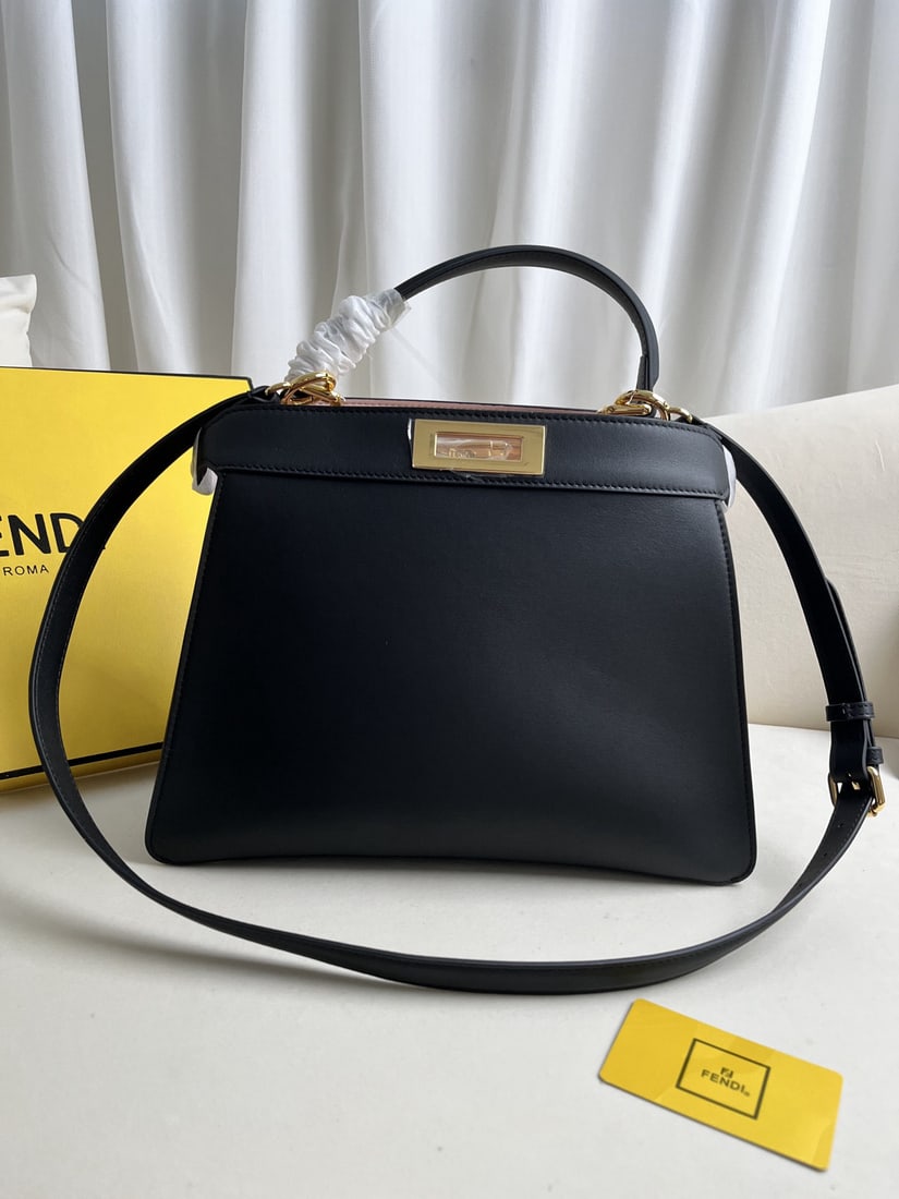 Fendi Peekaboo ISeeU: We offer FREE SHIPPING for both domestic and international clients who bid over $500. Large black Peekaboo ISeeU leather handbag. Iconic Peekaboo ISeeU medium handbag, made of leather with classic twi