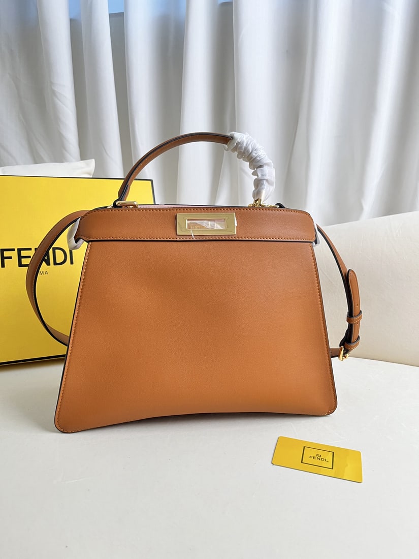 Fendi Peekaboo ISeeU: We offer FREE SHIPPING for both domestic and international clients who bid over $500. Large brown Peekaboo ISeeU leather handbag. Iconic Peekaboo ISeeU medium handbag, made of leather with classic twi