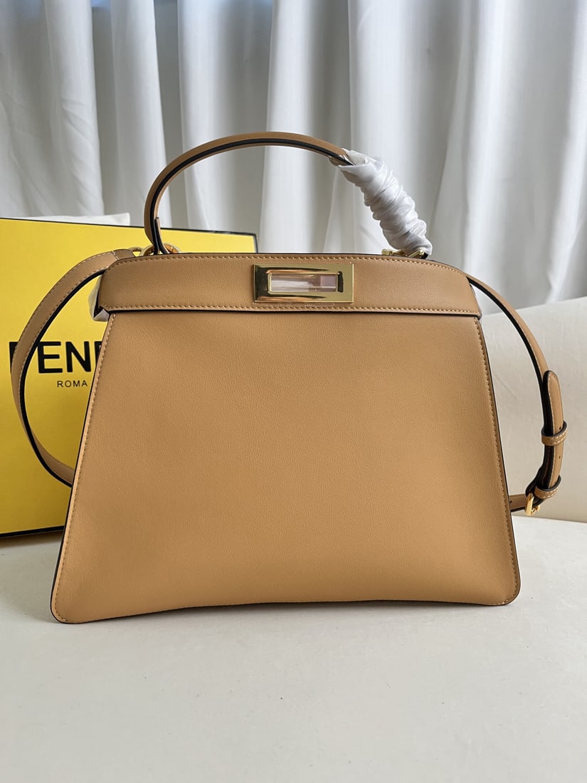 Fendi Peekaboo ISeeU: We offer FREE SHIPPING for both domestic and international clients who bid over $500. Large apricot Peekaboo ISeeU leather handbag. Iconic Peekaboo ISeeU medium handbag, made of leather with classic t
