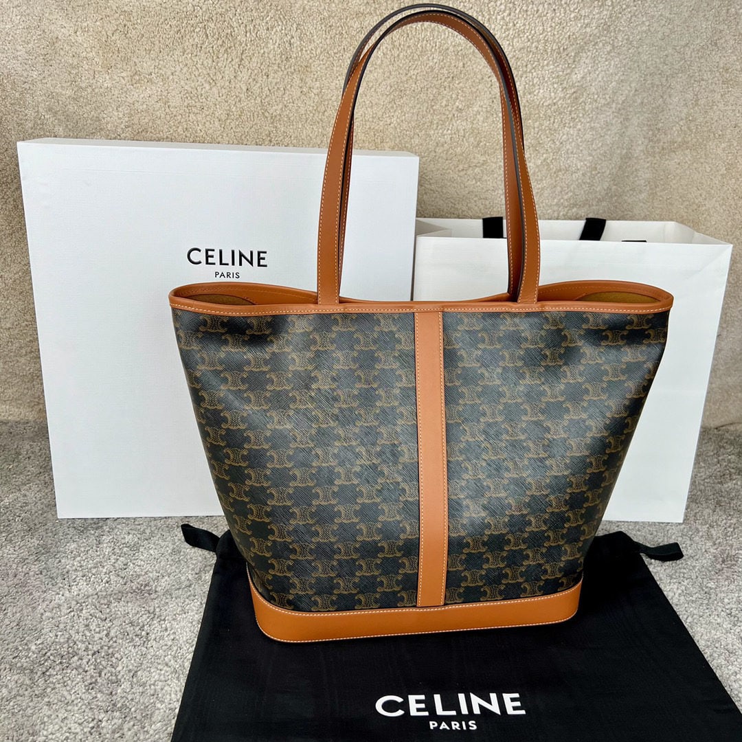Celine CABAS: We offer FREE SHIPPING for both domestic and international clients who bid over $500. CABAS Medium Logo Print Calfskin Handbag, measuring 31.5 x 31.5 x 16 cm. This size can accommodate up to a 14-inch