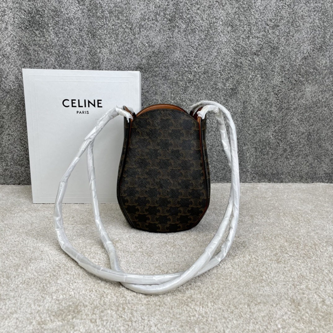 Celine Marlou Triophe: We offer FREE SHIPPING for both domestic and international clients who bid over $500. MARLOU TRIOPHE faux leather handbag, dimensions 22.5 x 16 x 16 cm, TRIOPHE CANVAS logo print, cowhide leather