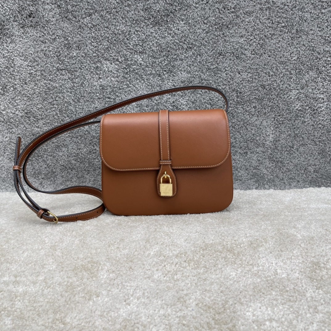 Celine: We offer FREE SHIPPING for both domestic and international clients who bid over $500. TABOU Medium Smooth Calfskin Leather Handbag 9 x 6 x 3 inches (22 x 16 x 7 cm) Calfskin leather, sheepskin