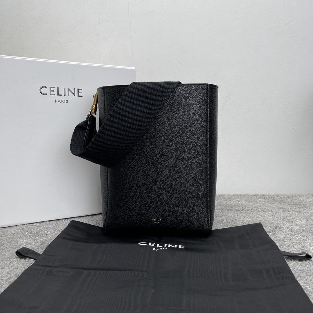 Celine: We offer FREE SHIPPING for both domestic and international clients who bid over $500. Black pebbled leather SANGLE BUCKET small soft grain calfskin bucket bag, 7 x 10 x 5 inches (18 x 25 x 12 cm).
