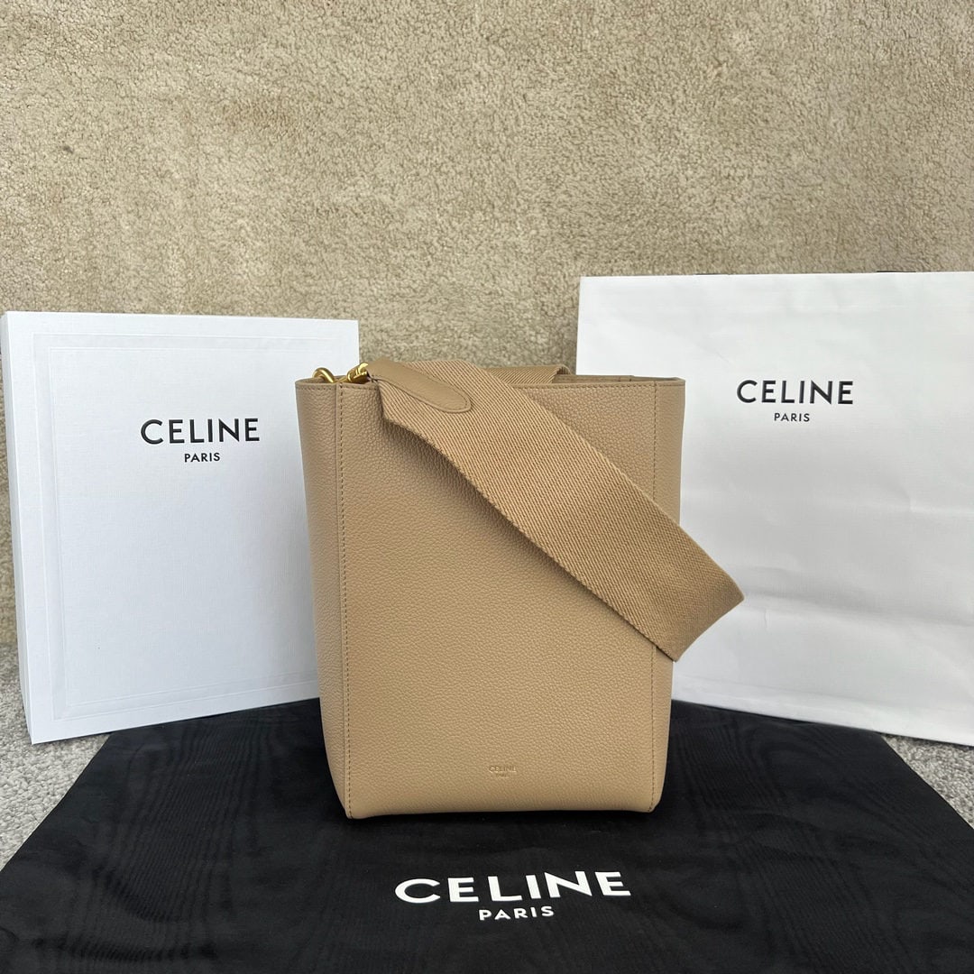 Celine: We offer FREE SHIPPING for both domestic and international clients who bid over $500. Apricot-colored, pebbled-grain SANGLE BUCKET, small size, soft grain calfskin bucket bag, 7 x 10 x 5 inches (18 x