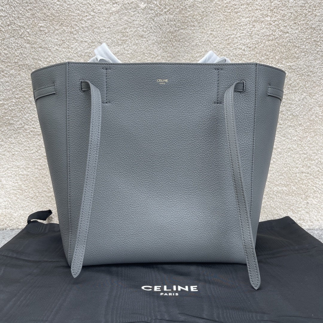 Celine: We offer FREE SHIPPING for both domestic and international clients who bid over $500. CABAS PHANTOM Lava Grey Small Soft Grained Calfskin Shoulder Bag with Leather Handles and Drawstring Closure. 11