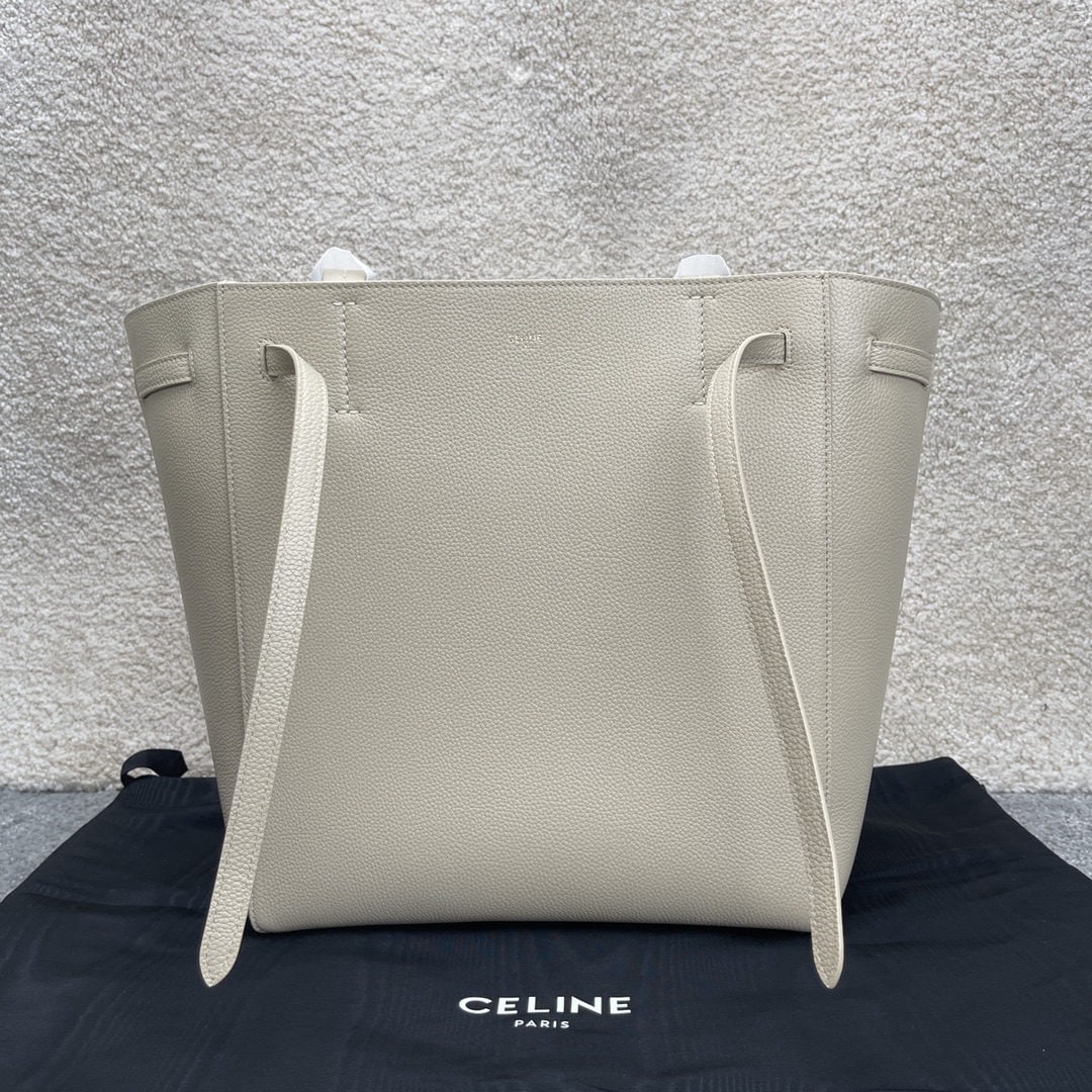 Celine: We offer FREE SHIPPING for both domestic and international clients who bid over $500. CABAS PHANTOM Cream White Small Soft Grained Calfskin Shoulder Bag with Leather Handles and Drawstring Closure.