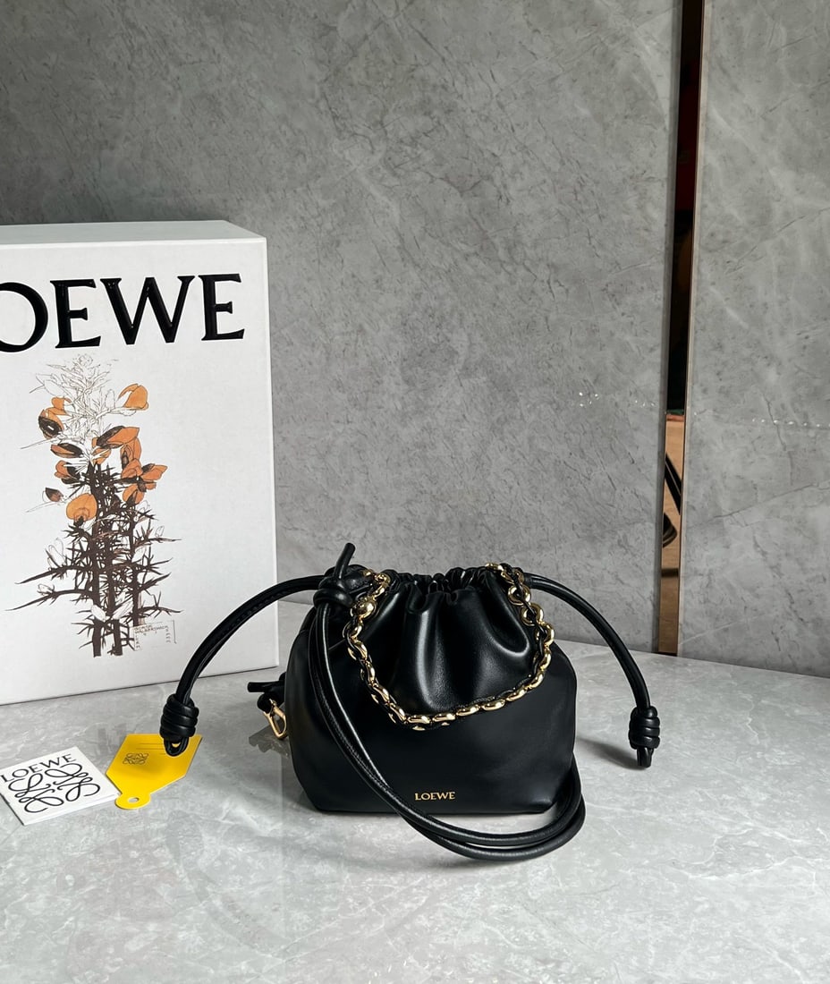 LOEWE Flamenco Purse: We offer FREE SHIPPING for both domestic and international clients who bid over $500. LOEWE Flamenco Purse lucky bag, small black. Features a pleated design and soft lambskin leather with a premium