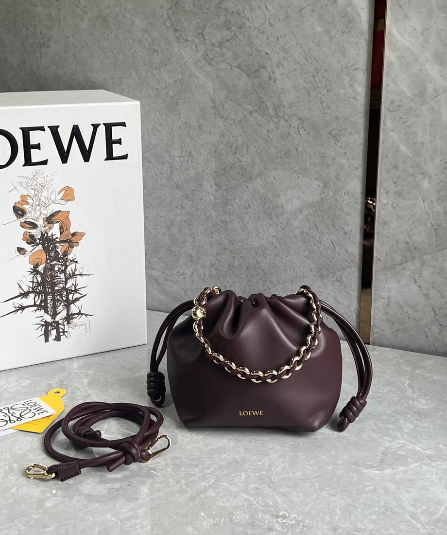 LOEWE Flamenco Purse: We offer FREE SHIPPING for both domestic and international clients who bid over $500. LOEWE Flamenco Purse Lucky Bag, Small Wine Red. Features a pleated design and soft lambskin with a premium feel.