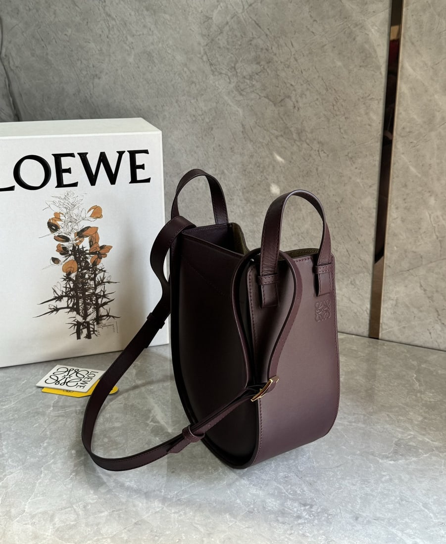 LOEWE: We offer FREE SHIPPING for both domestic and international clients who bid over $500. LOEWE's Hammock bag, the "Transformer" of the fashion world, is a new style I highly recommend!!! It's versatile