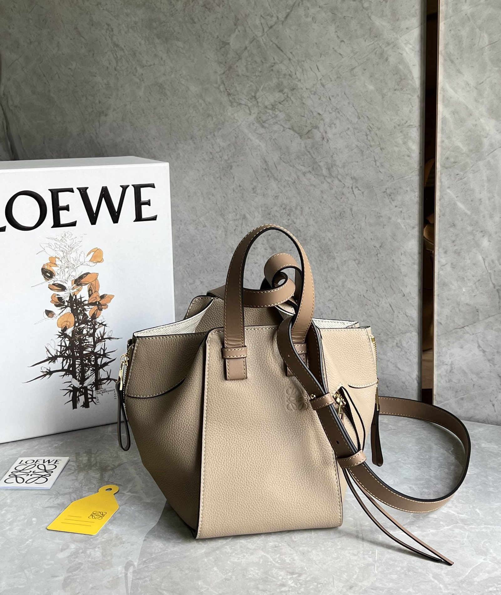 LOEWE: We offer FREE SHIPPING for both domestic and international clients who bid over $500. LOEWE's Hammock bag, a fashion "Transformer," is versatile enough for everyday wear, casual occasions, and