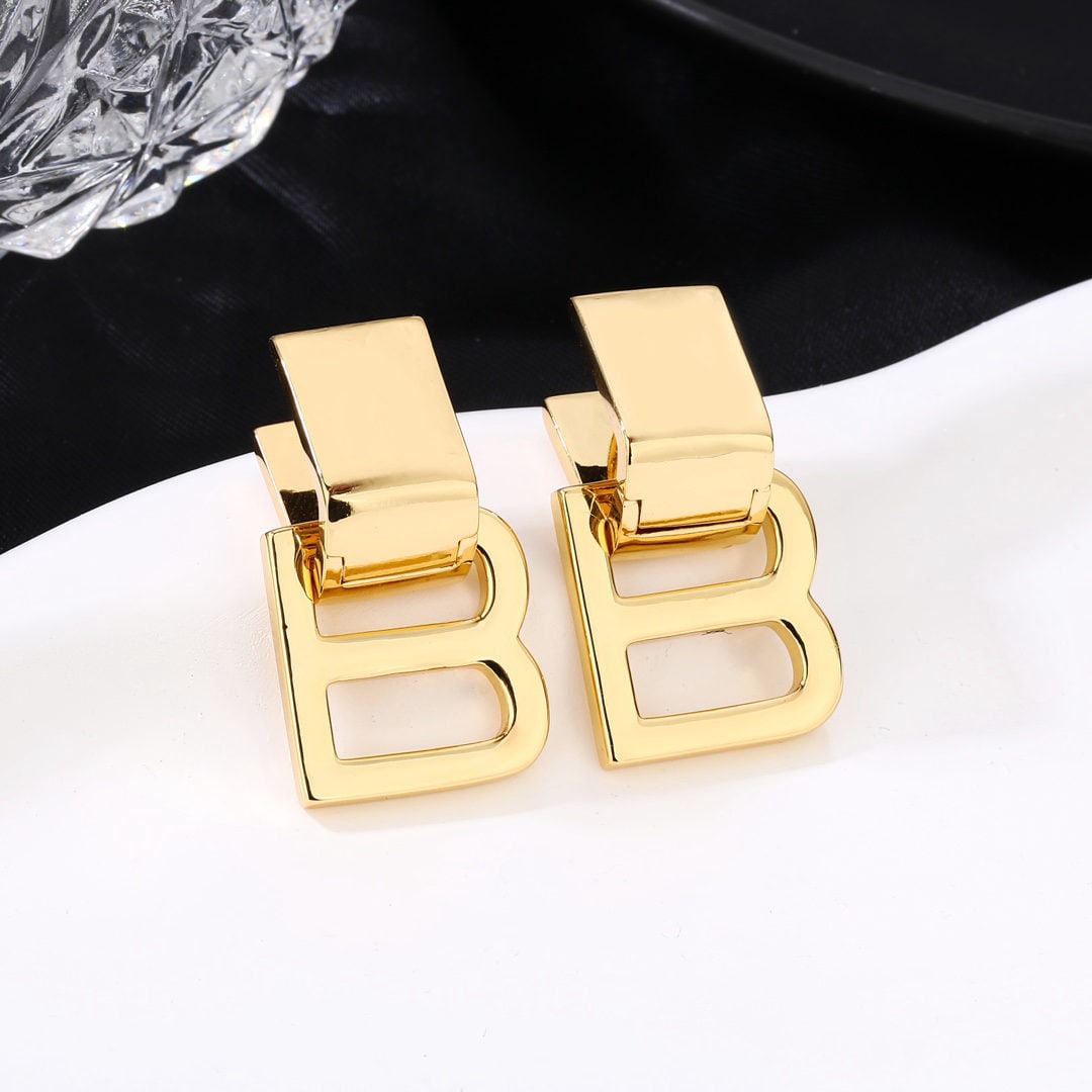 Balenciaga earrings: We offer FREE SHIPPING for both domestic and international clients who bid over $500. Balenciaga metal stud earrings, uniquely designed, avant-garde, and very beautiful. A wonderful gift for you or yo
