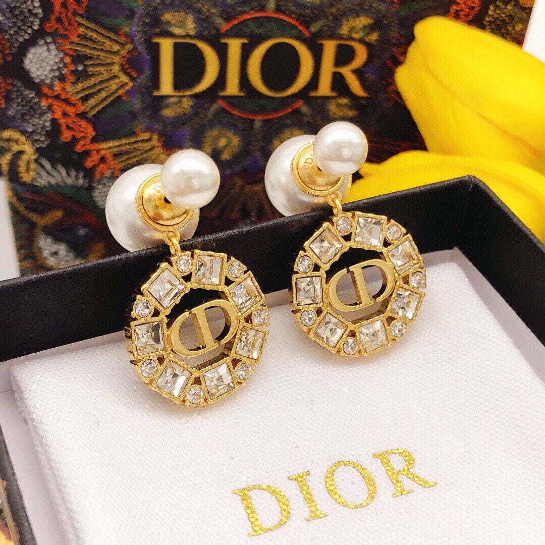 Dior letter-shaped round pearl stud earrings: We offer FREE SHIPPING for both domestic and international clients who bid over $500. These Dior logo-shaped, round pearl stud earrings feature a striking gold-plated Dior logo surrounded by shimmerin