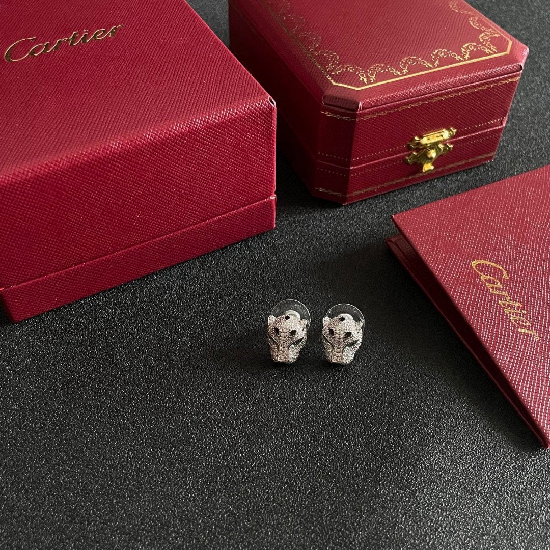 Platinum Cartier Panther Head: We offer FREE SHIPPING for both domestic and international clients who bid over $500. Cartier white gold panther head earrings, extra thick and bold, unique panther design, unisex, very rare for coupl