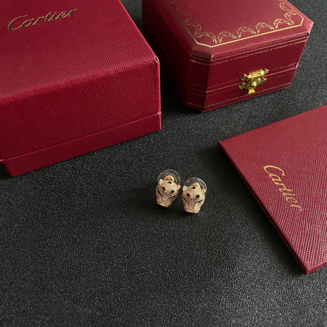 Platinum Cartier Panther Head: We offer FREE SHIPPING for both domestic and international clients who bid over $500. Cartier white gold panther head earrings, extra thick and bold, unique panther design, unisex, very rare for coupl